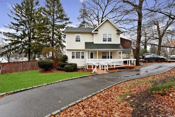 Lovely Colonial With Circular Driveway Located In Huntington Station. This Home Features Hardwood Floors Throughout, Eik, Living Room W/Gas Fireplace, Office/5th Bedroom, Full Bath On First Floor. Second Floor Features Master Bedroom W/Jack & Jill Bathroom & 3 Additional Bedrooms. Glass Sliders Leading To A Large Deck, Overlooking The Spacious Backyard, One Car Detached Garage Is Fully Accessible From The Front & Backyard. Close To Schools, Shopping, Restaurants & Transportation.