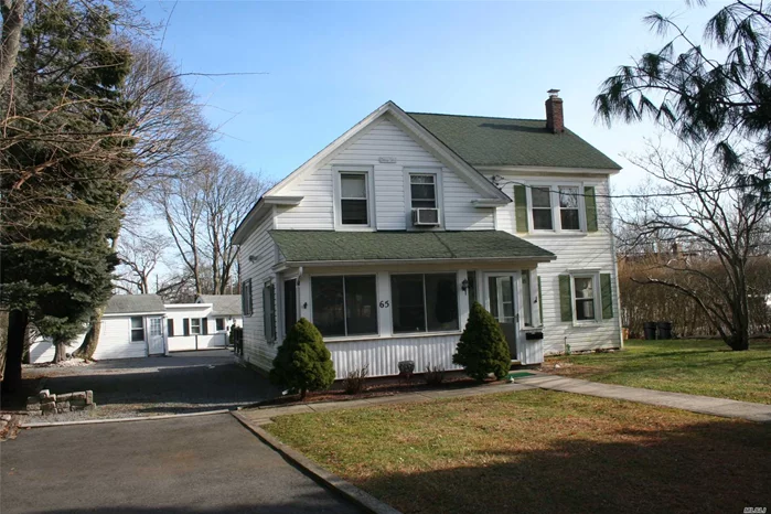 This Sayville Classic Colonial Has Much Potential. 4 Bedrooms And 2 Full Baths. On Almost An Acre Of Land. Detached 1.5 Car Garage .The House Comes With A One Bedroom One Bath Legal Cottage With Private Drive Way. This House Is Walking Distance To Beautiful Downtown Sayville. Close To Shopping And Transportation. Just Minutes From The Great South Bay. Sayville Schools.