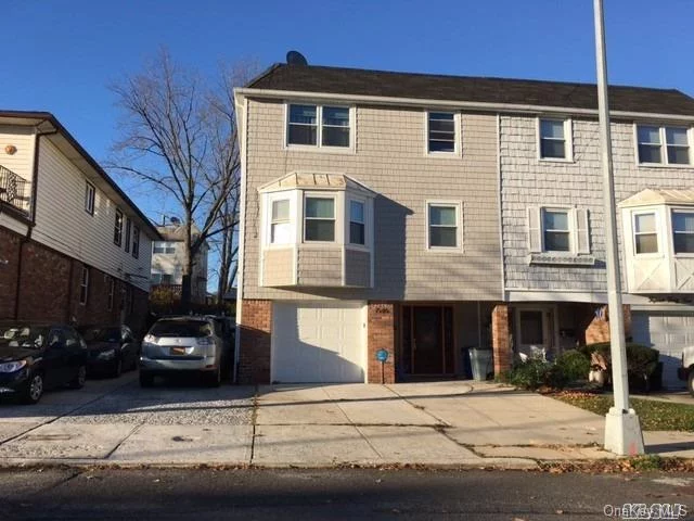 Beautifully Renovated And Spacious Triplex 3 Bed, 2.5 Bath, Garage Plus Additional Parking,  Back Yard. Tenant Pays Broker Commission