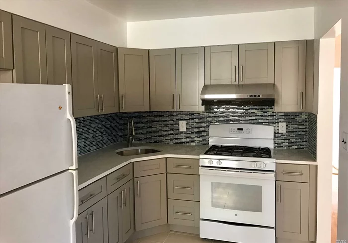 Beautiful Renovated 2 Bedroom & 1 Bath In Prime Bayside Location By Bell Blvd & Northern! Bright & Spacious Unit! Updated Kitchen W/ Granite Countertops, Hardwood Flooring Throughout. 975 Sqft Of Space With Large Bedrooms & Living Area And Formal Dinning Room. Close To Transportation (Q12, Q13 To Main St. & Q76), Eateries (Northern Blvd & Bell), Shopping & Schools. Center To It All! Heat & Water Included! Walk To Lirr! Parking Spot Available +$100/M