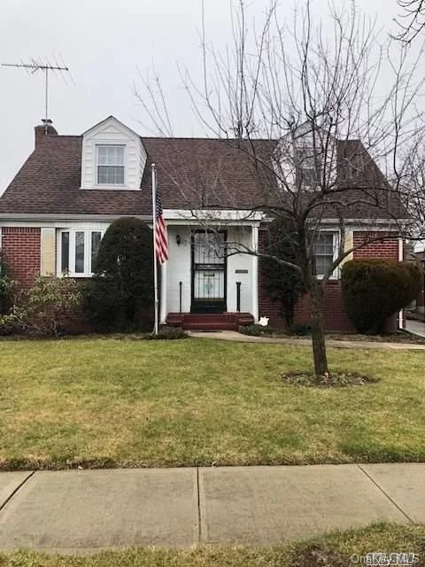 Wideline Cape, Mid-Block Location. 4 Bedrooms, Fdr, Flr, Gas Cooking, Alarm System, 5 Zone Inground Sprinklers, Extended Family Room, Playroom In Basement.