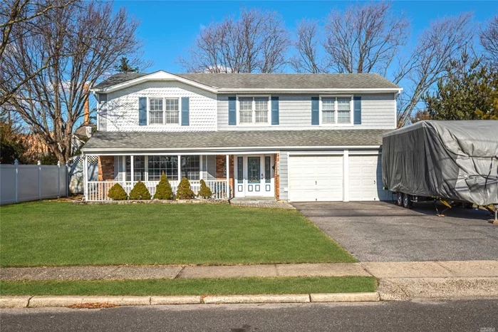 Expansive Colonial South Of Montauk With Many Updates! New Floors, Kitchen Countertops, Central Air, On Demand Boiler, Bathroom & More! This Colonial Boasts 6 Bedrooms, 2.5 Baths, Master Ensuite, Oversized Living Room, Den With Fireplace, 3 Season Room, 2 Car Garage & Much, Much More! No Flood Insurance Required