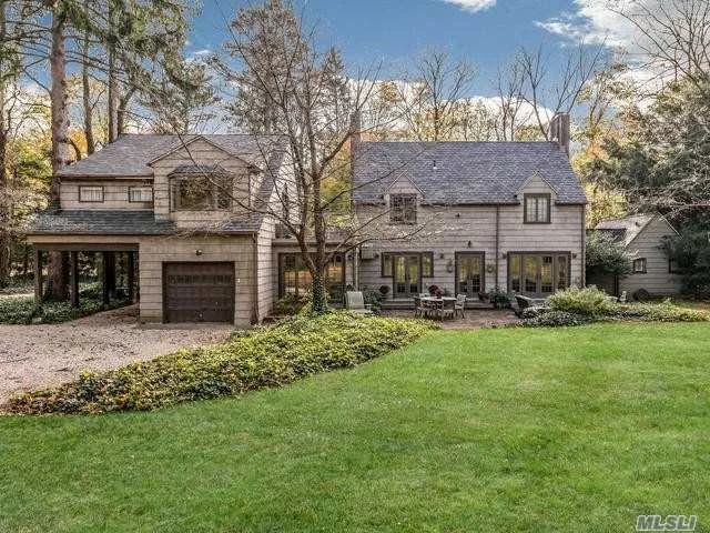 Presenting A Truly Unique 1926 Gate House. This One Of A Kind Residence Was Part Of The Former Astor Estate Which Now Encompasses Harbor Acres. Set On 2.3+ Beautifully Landscaped Acres With A Tennis Court And Expansive Brick Patio. This Enchanting Residence Is A Fluid Blend Of Contemporary And Craftsman Architecture. An Abundance Of Light Enhances All The Principal Rooms, New Custom Kitchen And Expansive Master Suite With Vaulted Ceilings Designed And Built For John Mcenroe. Harbor Acres Affords