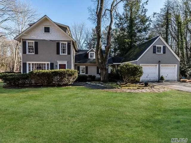 Charming Home Circa 1898. 9 Ft&rsquo; Ceilings And Exposed Beams, With Original Wide-Plank Flooring and walk-up attic. Two-Car Garage With Loft. Near picturesque village of Cold Spring Harbor and within walking distance To L.I.R.R. Station. Great Opportunity in Syosset School district!