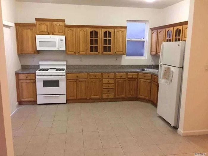 Lovely 1 Family Home For Rent Built In 2008. Very Bright, Neat And Clean, Freshly Painted Offers Good Size Bedrooms 15X10, 5 Lg Closets, Spacious Lr , A Very Large Kitchen With New Stove And Microwave, Hard Wood Floors,  Balcony, Private Yard And Huck Ups For Washer & Dryer.