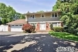 Large Home With Fantastic Over-Sized Property. Featuring Spacious Rooms, Family Room With Fireplace, Deck Off Kitchen. Minutes To Railroad, Town, Golf Course, And Park. Near Northern State Pkwy And 495 Highway, Convenient To All.