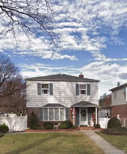 Immaculate Home In The Heart Of Bayside....Great Location....1 Block To N Blvd. Short Walk To Bell Blvd And The Lirr.. Corner Manicured Property. House Has Carpeting With Hardwood Under. Hw And Heating System Is A Few Years Old.