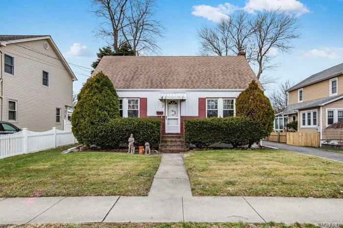 Cape Cod Style Home Features Hardwood Floors, 4 Bedrooms, 1 Bath, Great Expansive Yard! Gas Stove, Hot Water & Dryer! House Being Sold In As Is Condition. Award Winning Seaford Schools! Near Major Highways & Transportation & Parks