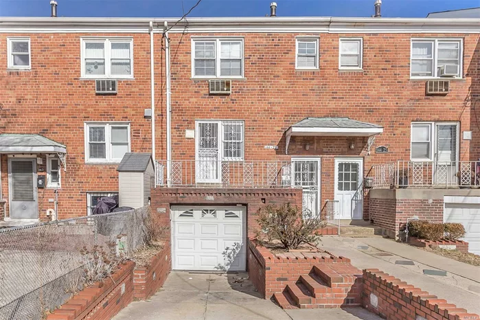 Excellent Income Producing All Brick Two Family Property In Great Location Of Flushing! 3 Bedroom Duplex Over Studio With Beautiful Backyard Garden, Private Driveway And Garage, Washer Dryer And Updated Kitchens. A Must See!