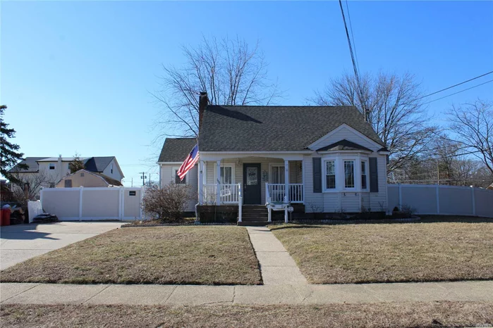 Beautiful Cape With Dormer Sitting On .24 Acre Property, New Floors On Main Floor With Wood Burning Fireplace In Living Room, Newly Remodeled Bathrooms, Sliding Doors To A Wood Deck Leading To A Spacious Yard