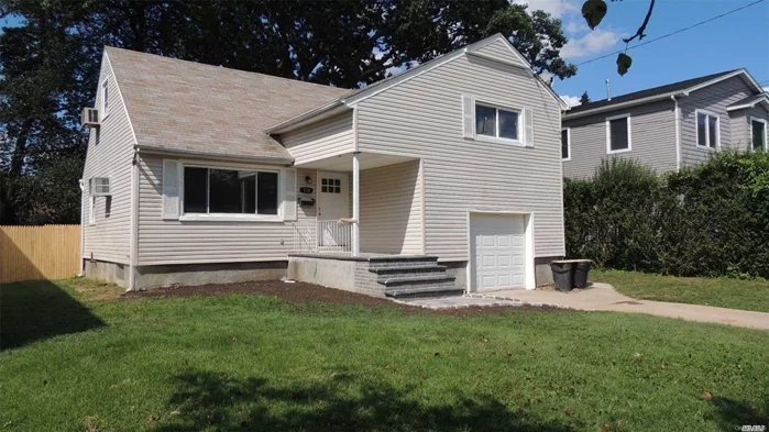 Newly Renovated Split Level Home.Two Master Bedrooms With His And Her Closets. Extra Closet Space And Storage. Decorative Lighting All New Appliances And Hard Wood Floors.All New Doors And Windows. Washer, Dryer And A/C. Huge Back Yard With Half Court Basketball Area. Merrick School District Close To Town And Railroad.