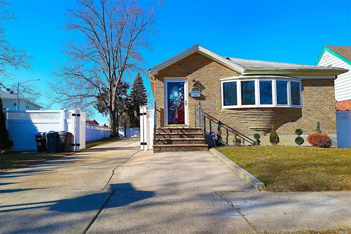 Proudly Present This Amazing Contemporary Custom Ranch House With Fabulous Living Space. New Gas Heat, New Windows, New Electrical Panel With New Wiring . Eastern Exposure Sunny House ! Private Long Driveway. Top School District #26. P.S.203 Elementary School, I.S 158 & Cardozo H.S. Full Finished Basement W/High Ceiling. Very Quiet Block And Convenient Transportation, Q27 Bus To Flushing! Terrific Curb Appeal Great Flow Of Entertaining.