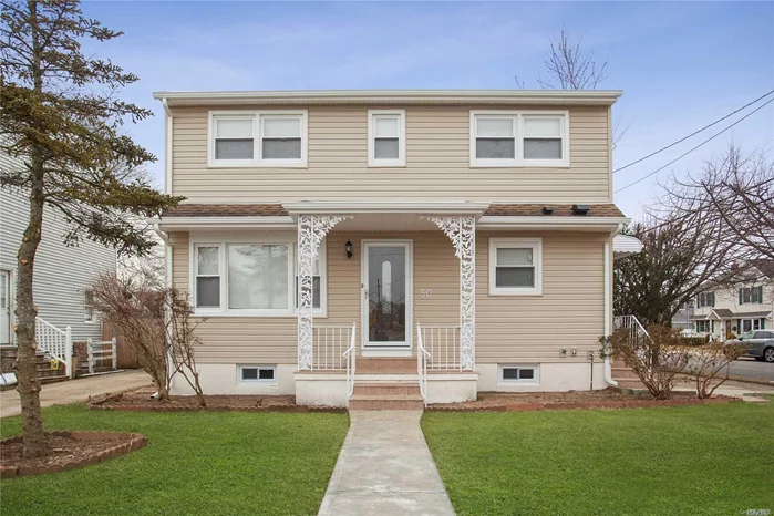 Impeccable Newly Renovated Colonial Home. First Fl Features A Beautiful Living Rm, Dining Room, Updated Kitchen With Stainless Steel Appliances, And A Master Bedroom Along With A Full Bathroom. Large Second Fl With 5 Spacious Bedrooms. Full Finished Basement With Full Bathroom And Separate Outside Entrance. Walking Distance To Lirr Station & Public Library. Highway Exit Only A Few Blocks Away.