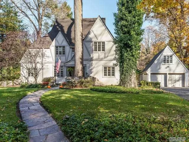 Majestic Normandy Tudor In Baxter Estates. Steep Rooflines, Mullioned Windows And Tudor Framing, Statement Fireplace And Chimney, Stone Walls At Entrance- All Hallmarks Of The Normandy Style Are Present In This Special Property. Lovingly Updated With Sensitivity To The Home&rsquo;s Architectural Integrity. Expansive Backyard And Porch For Entertaining, & Perennial Gardens.Short Walk To Town, Train And Beach