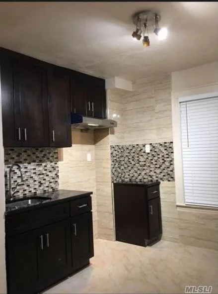 Newly Renovation Home 1st Floor Unit Of Multi Family, Located Great Location, Close To Lirr, Q65, Q27 And Q12. Convenience To All. School District 25. Brand New Hardwood Floor. Plenty Windows. High Ceiling With Gorgeous And Luxury Light Fixture And Much More.