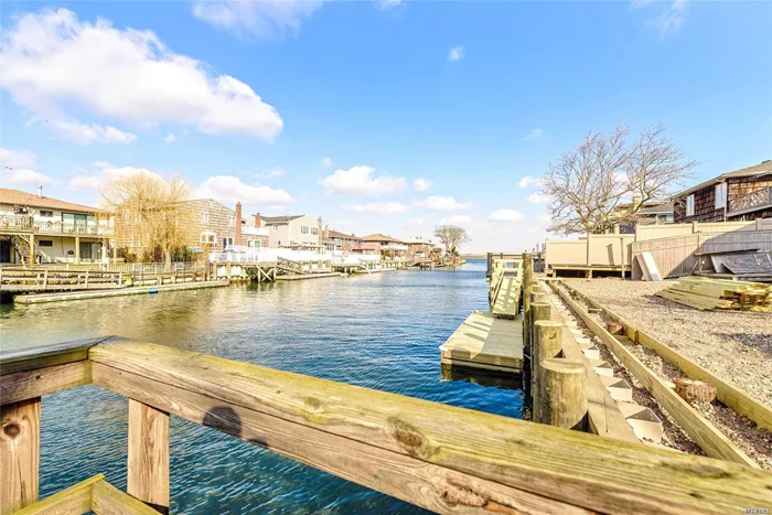 Lido Beach. Large Waterfront 5 Bedroom, 3 Full Bath Colonial, Large Eat In Kitchen, Huge Great Room With Fireplace. Master Suite With Huge Closet, Dressing Area, Full Bath, And Sauna. Porch Deck And Patio.