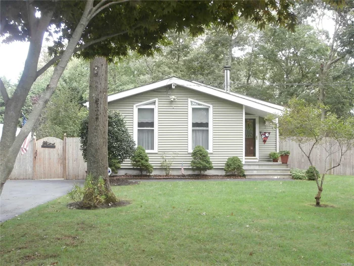 Beautifully Maintained, 3 Bedrooms/1.5 Bathroom Ranch On Corner Property. Also Features Living Room W/Wood Burning Stove & Vaulted Ceilings, Eat-In Kitchen, Hardwood Floors Throughout, Alarm System, Full Basement, Fenced Back Yard, Low Taxes. Award Winning William Floyd School District.