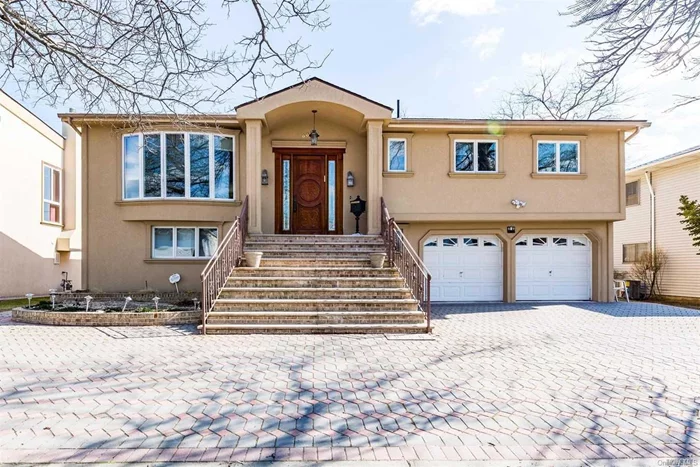 Extraordinary Expanded High Ranch Nestled In North Woodmere. Fully Equipped Rare Beauty Of Excellence & Perfection. Magnificence Designed State Of The Art Kitchen With Top Of The Line Appliances. Stunning Backyard With Waterview & Beautiful Landscaping.