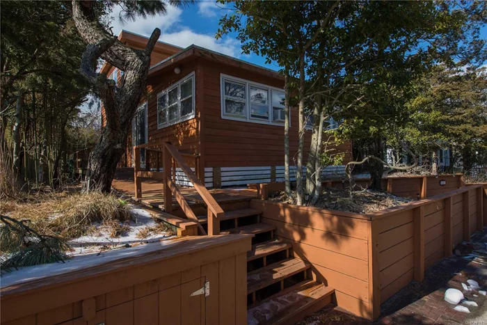 This Unique Home Is On A Residential Block, Fourth House From The Beach. Featuring 2 Master Bedrooms Each With Their Own Full Baths And On Different Floors From Main Living Area. Cathedral Ceiling In The Living Room. Very Bright And Spacious. Large Bi Level Deck For Outside Enjoyment!