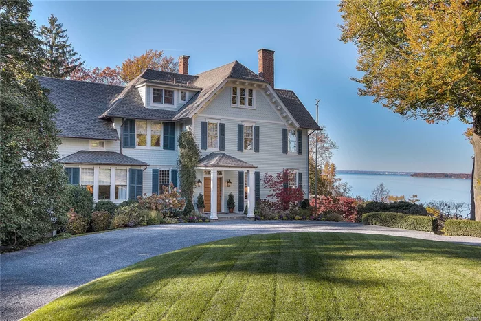 Breathtaking water views overlooking Cold Spring Harbor to Connecticut! Historic 1868 home with every modern amenity. 10 Foot ceilings and magnificent architectural details. Charming separate cottage with private entry. Beach & mooring rights - Laurel Hollow Village Beach.