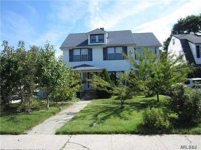 Lovely 1st floor appt . New kitchen, new bath, fireplace, finished basement, Deck in the rear. Parking spot in garage and 1 in driveway.