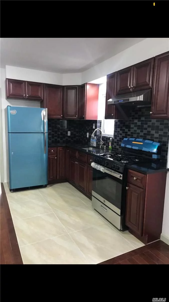 Newly renovated duplex apartment . First floor plus basement. One block away from bus Q25.