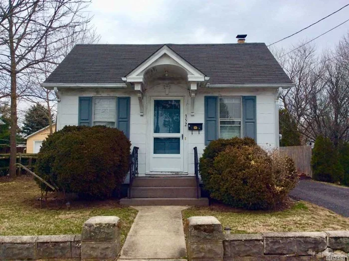 Storybook cottage ready for you to make your own. Home features include one bedroom, living room, dining room, kitchen, bath, hardwood floors, basement, lovely yard and single car garage. Heating system just switched to natural gas. Easy access to both the north & south forks.