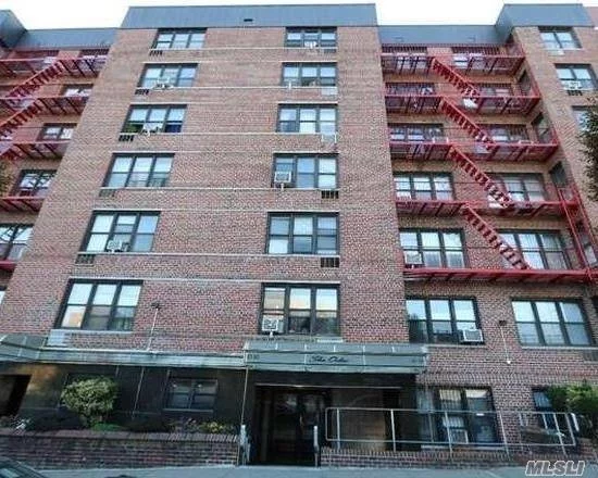 Charming Coop. Apartment, X - large Living Room, Formal Dining Room, nicely located, shops, schools, walk to subway, elevator, laundry, parking. Apartment just updated and renovated.
