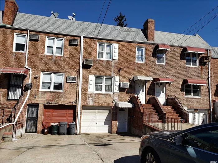 Great 2 family in prime Flushing location.. First floor is a one bedroom apartment with a large living room, Eat in Kitchen, hardwood floors and finished basement. Second floor is a two bedroom apartment. The home has 1 car garage and a private nice back yard area