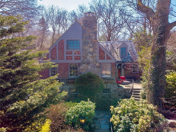 Charming Brick Tudor w/Waterviews Located in the Best Spot above Hempstead Hbr & Below The Village! Easy Access to All! Open, Airy & Happy Define this Beaut.Maintained Home. Great Flow For Entertaining!Slate Roof, Redone Oversized Gazebo & Sports Court.Lower Level Adds a Whole Other Dimension..1st Flr Oversized Master Suite & Gourmet EIK w/Wolf Range & Sub Zero Frig. CAC 1sL Flr.Lots of Backyard Space for Entertaining & Fun! Close to SC Beach, Restaurants, Sunsets & Music