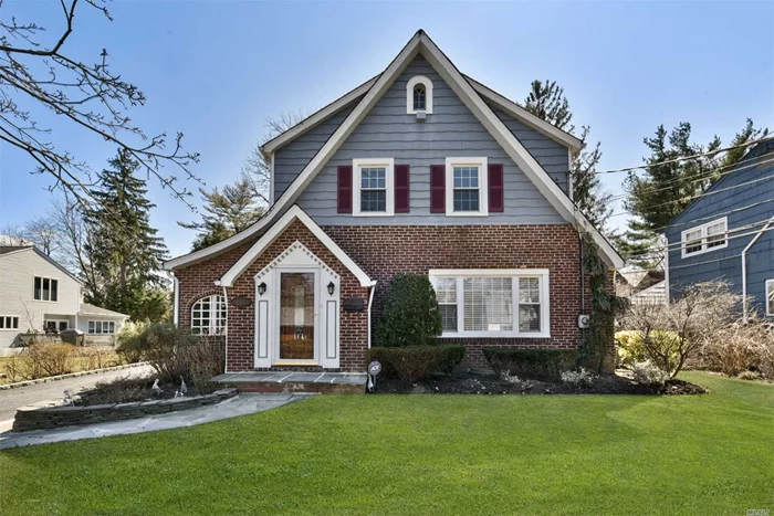 Move-in ready Brick Colonial in Village of Thomaston. 1st Fl boasts LR with Fireplace, Huge Updated & Expanded EIK with High Ceilings, Formal DR/Den with Beautiful Wood Beams and Powder Rm. 3 Large BR and Full Bath upstairs. Spacious Finished Basmt with 2 BRs, Large Spa-like Bath, Bar and Laundry. 2 Car Garage. Paver Patio; Covered Side Porch. Close to LIRR and town. GN South Schools.