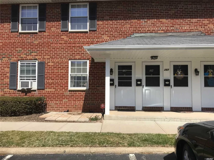 Absolutely lovely! Extra cabinets and counter space in this updated kitchen. Hardwood floors, updated bath, spacious rooms, washer/dryer in unit! Owner and Visitor Parking, mail delivered right to your door! Garage when available is extra charge. Taxes included in maintenance, also includes heat and hot water. Ground floor unit! Why rent when you can own!