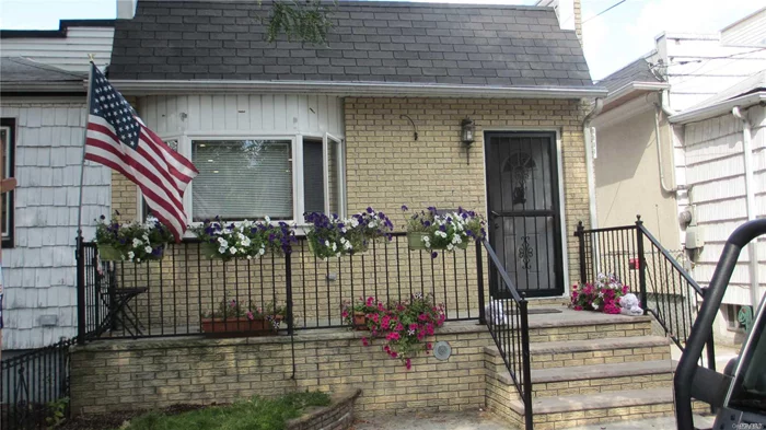 A Spacious House For Rent In Ozone Park. It Features A Beautiful Kitchen, Large Living Room With Skylight, Hardwood Floors Throughout , Ample Closet Space, Upgraded Lighting, A Fully Finished Basement And Charming Backyard. The House Is In A Great Neighborhood, Close To Buses, Stores And Schools.