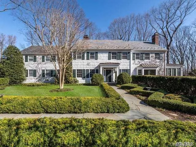 Charming updated Ted Lay Center Hall Colonial on 3.6 Matinecock acres with pool located on a quiet Country Lane. Light and Bright sitting high on a hill, this 7 bedroom house has wonderful entertaining space while offering Classic Style. Beautifully interpreted for Today&rsquo;s Living. All Updated!