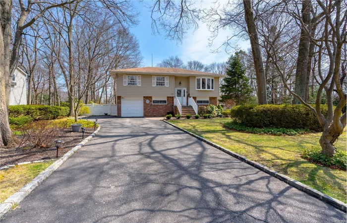 Well appointed turn-key home on one of the largest lots in the area. Located on a quiet cul-de-sac lane featuring one half acre of mature landscaping, privacy, and a serene koy pond.Many recent updates include new windows, siding, bathroom, and upgraded electric service. Awesome guest wing room for mom! Original home ownership pride & Islip Schools- Won&rsquo;t last! Enjoy summer nights in your very own outdoor oasis.