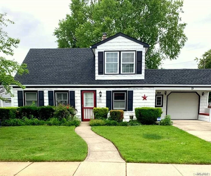 Lovely mid-block cape!Updates include new floors, recessed lights on the 1st fl, eat-in kitchen with plenty of cabinet and counter space and two tiled/windowed baths. The main entrance leads to an airy living/dining area, the kitchen with a separate side entrance that takes you to the backyard, a bedroom& a full modern bath. The sun-filled 2nd fl has 2 spacious brs a full bath. Ample closets, above ground oil tank&a large backyard.MacArthur schools, min away from highways, shopping, restaurants.