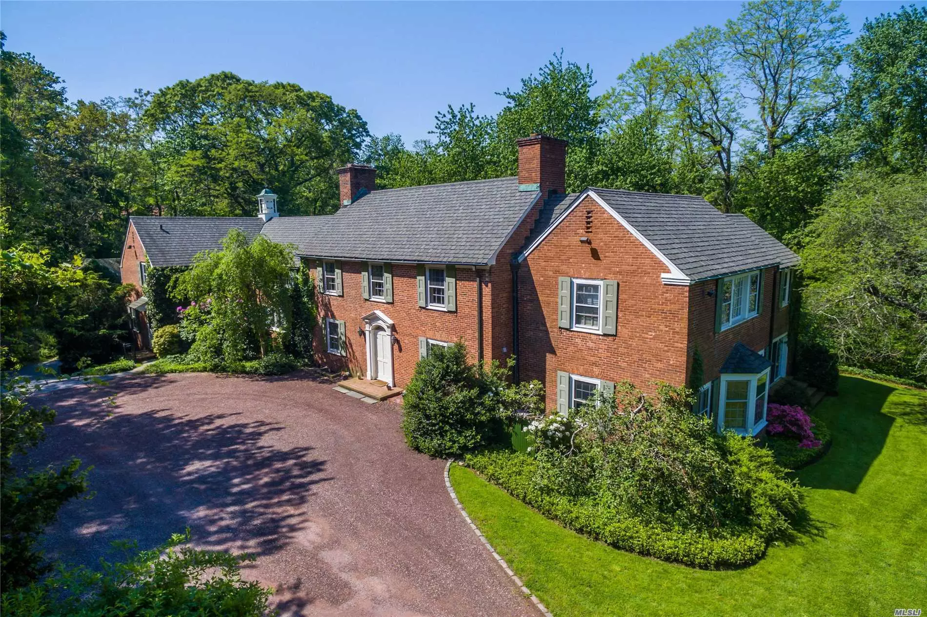 Are you looking for total privacy on a Private Road surrounded by your own 5 plus acres of lawns and towering trees in the heart of Mill Neck? Built in 1929 as a summer home and lovingly updated thru the years with many amenities.