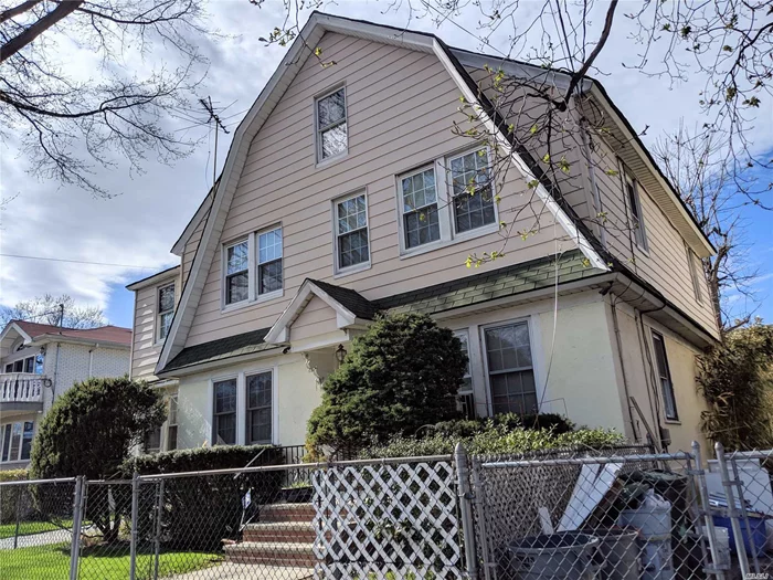 Two buildings on an oversized lot in the heart of Bayside. Front - large one family building. Rear - three-family building (a duplex two-bedroom apt; a one-bedroom apt; a two-bedroom apt). Large potential rent roll, approx. $10k per month. Private driveway for up to 6 cars. 5 electric and gas meters. Great property for owner uses or investors!