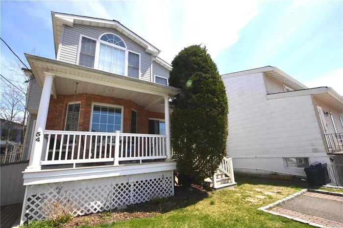 This is a beautiful legal two family duplex. First and second floors are identical. Diamond condition--vaulted ceilings, granite countertops, hardwood floors throughout, high hat lighting. Exclusive rights to Manor Park, which is within walking distance, includes water sports such as sailing. Close proximity to LIRR. Move in ready.