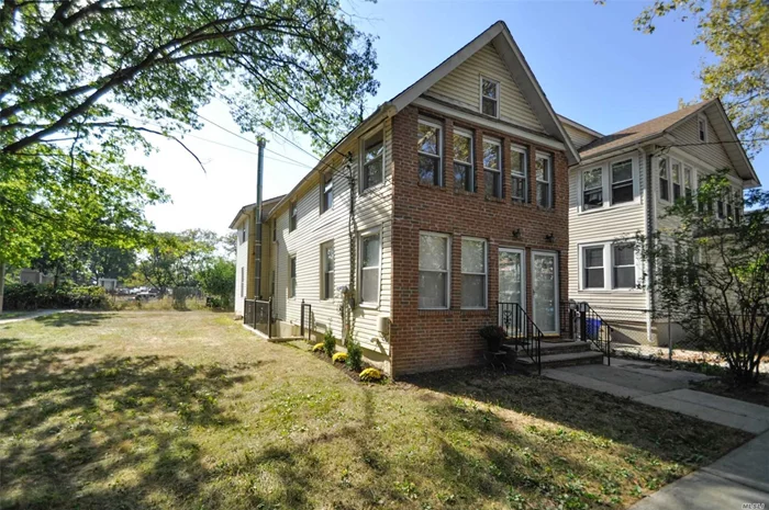 Corner Two Family on Dead End Street, Extended and Completely Renovated in 2005. 3 Bedrooms over 3 Bedrooms, Hardwood floors throughout, Finished Bsmt. 2 Boilers, 2 Hot Water Heaters, 2nd flr water sub-metered.  Potential to Acquire Adjacent Lot 10 X 92 owned by City. LIRR, Express Bus, Shops Restaurants , School District 26. 2nd floor vacant. Vacant. Building sized approx 18 X 56.2 AMAZING VALUE !!