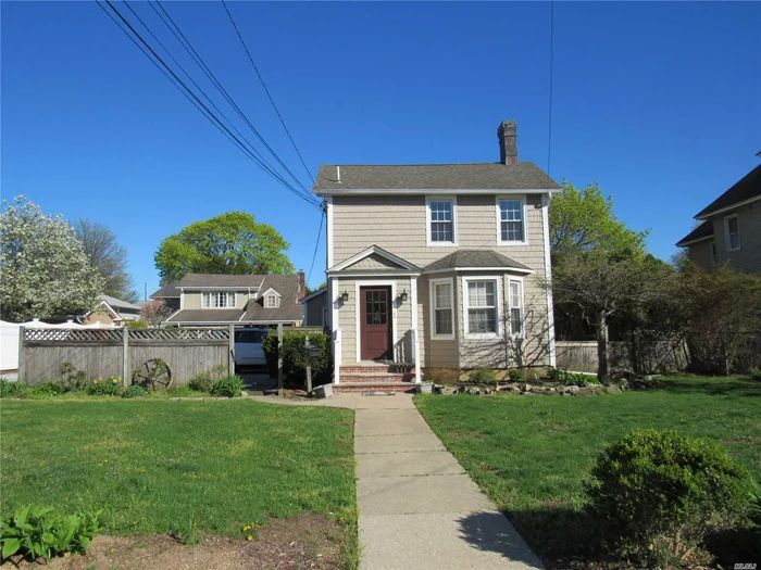 Sun Filled Completely Renovated 2 Bedroom Features Private Entrance, Entry Foyer Coat Closet & Storage, Very Large Living Room/Dining Room, Bonus 3 Season Room, 2 Bedrooms On Opposite Ends, Front Bedroom With Cathedral Ceilings, Ceiling Fan & His & Her Closets. Eat In Kitchen, Full Bath With Soaking Tub, Parking For 2 Cars. Close To All Shopping & LIRR.