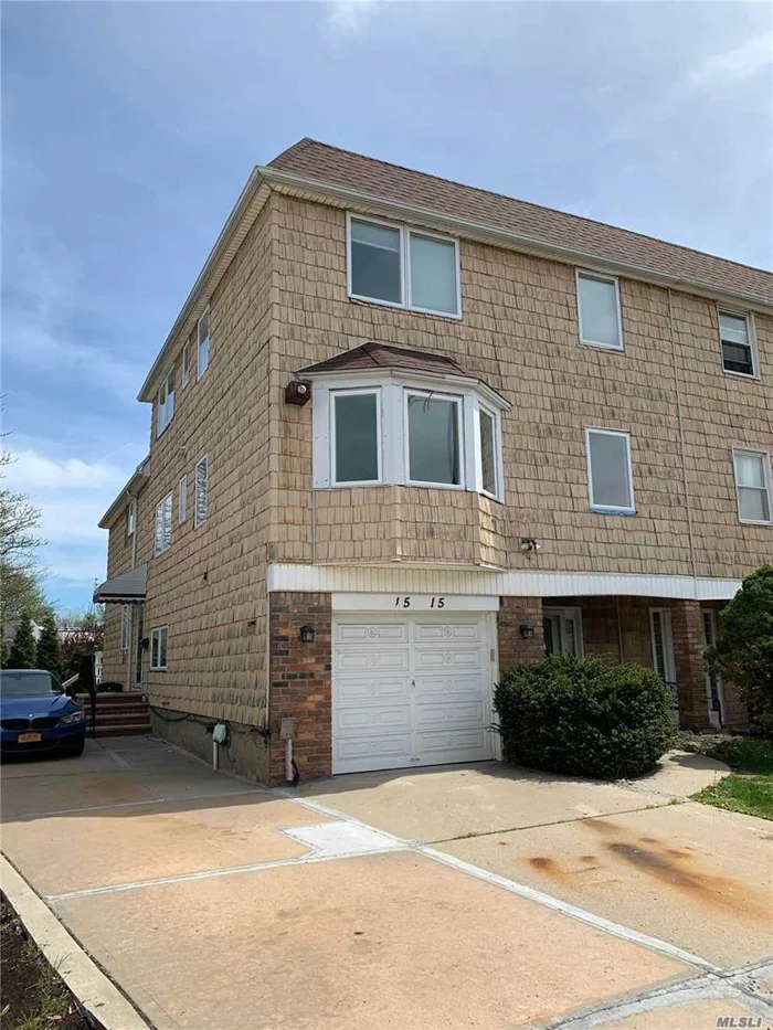 Brand New Triplex W/Garage Near Bay Terrace Shopping Center Area of Bayside . 3 Levels Living Space Over 2000 Sf, Hard wood floors throughout .3, Br 2, 5 Baths, Office .Easy Access To All Transportation, Lirr To Penn, Express Bus To Manhattan , Washer and dryer included.Fenced Back Yard, Garage, 2 parking spot. Great location, Walk To Fort Totten Park by the Water.