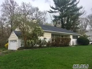 Mid-Century front-to-back split has vaulted-ceiling livingroom with brick woodburning fireplace, diningroom & eat-in kitchen on main floor. Upstairs is Master Bedroom & Bath plus bonus unfinished room, 2 bedrooms & Bath. The lower level Den has a fireplace and opens to backyard & patio, 1/2 bath, utility rm & 2-car garage. Hardwood floors under carpet on main fl & upstairs. Taxes are being grieved.