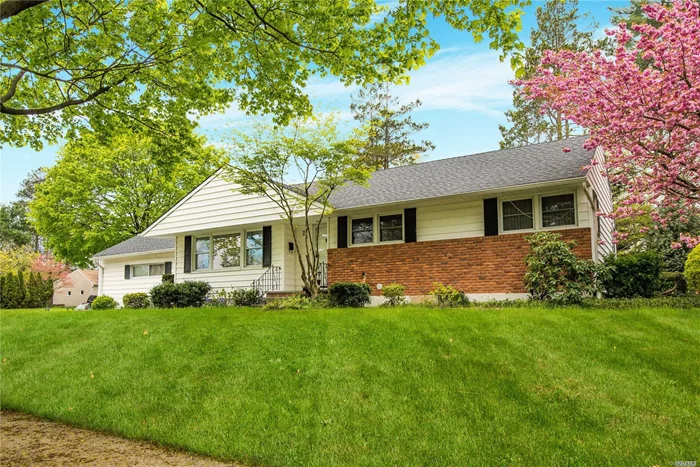 Welcome home! This sunlit ranch sits on beautiful flat property with speciman plantings. Plenty of room to mingle with the L shape livingroom/dining room and accees to the screened in patio. A full basement with wet bar and laundry room for additional space. Hardwood floors throughout and a woodburning fireplace for cozy winter gatherings. Located in the Roxbury area of Glen Cove.