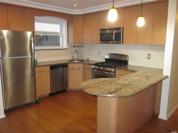 Open concept living room/dining room 3 bedroom 1 bath Apt near all major highways and NYC buses. The Apt features all hardwood floors through out with updated stainless steel kitchen appliances only water is included.