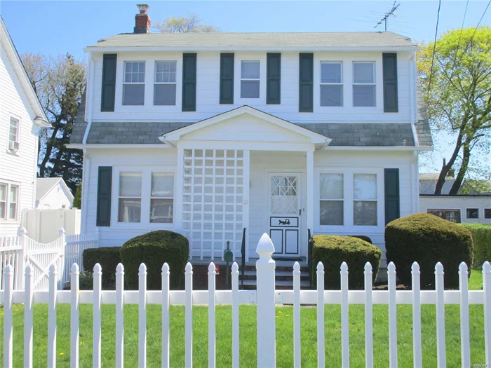 Well maintained 5 bedroom, 2 bath Colonial , with beautiful moldings and old world charm. This house has a formal dining room, a spacious living room, a large walk-up attic and a full basement. The property has a long driveway that takes you to a 3 car garage, including one being used for storage. The property is on a mid-block location and is convenient to shopping, dining and transportation.