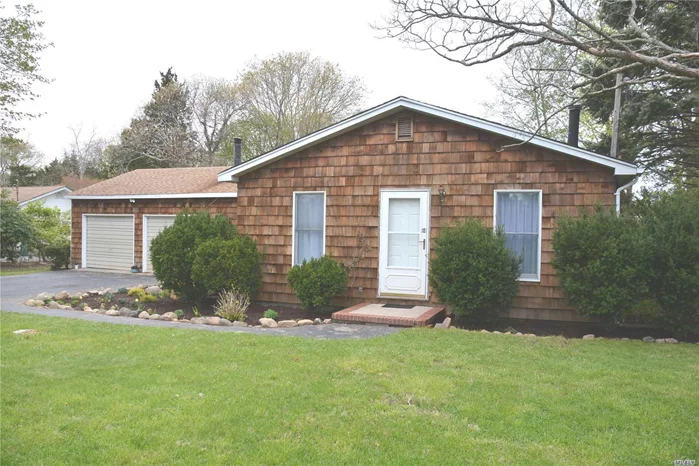 Cedar Shingled Ranch with Seaside South Jamesport Setting. Large backyard with room for pool. Spacious Living Room. Put your own style and ideas onto this blank canvas. Great Location! Close to the marina, numerous sandy beaches and playground. Wine country and fabulous North Fork restaurants.