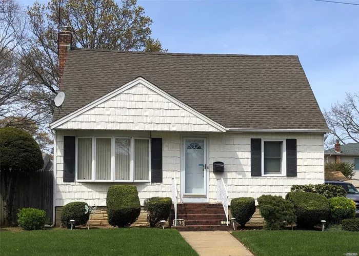 Stunning N Massapequa Cape with charming detail from the mouldings to the big bay window basking the living room in natural light. Legally eat-in-kitchen extension with stainless appliances. First floor bedroom and full bath, two more bedrooms and addtional full bath on second floor. Full basement with finished area and laundry room...lots of storage, too! 4-zone gas heat. Enjoy the great outdoors in your private yard. Spacious detached garage. It&rsquo;s all right here!