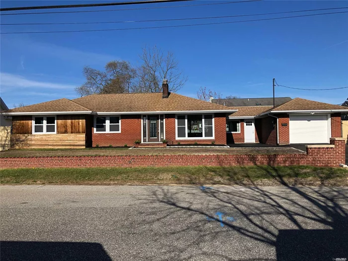 Completely redone spacious Ranch-style home on 100x100 property with attached garage. Large living room, dining room, wood burning fireplace, all on open floor plan, private fenced backyard. Close to village shopping and the Long Island Railroad. Don&rsquo;t miss this one!