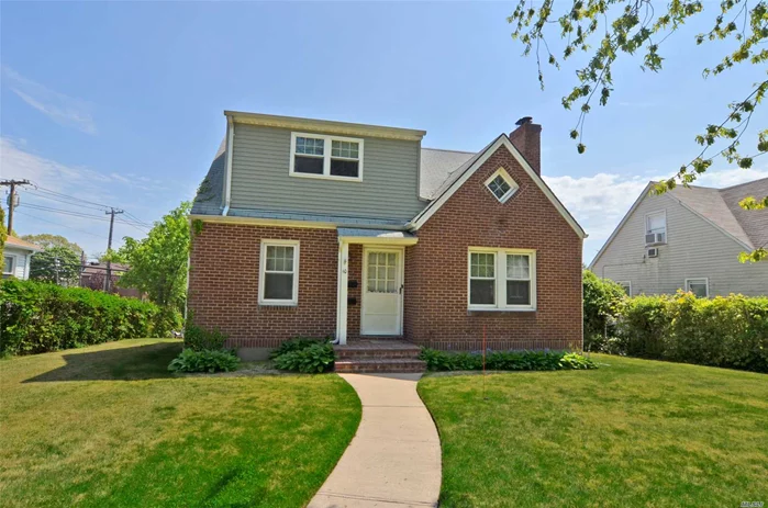 Two family house on large lot. House overlooks Manorhaven Park. Property goes through to Orchard Beach Blvd.